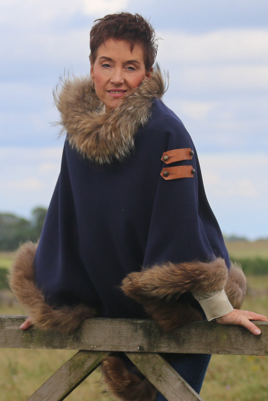 Classic Poncho style cape with reworked natural full fur trim