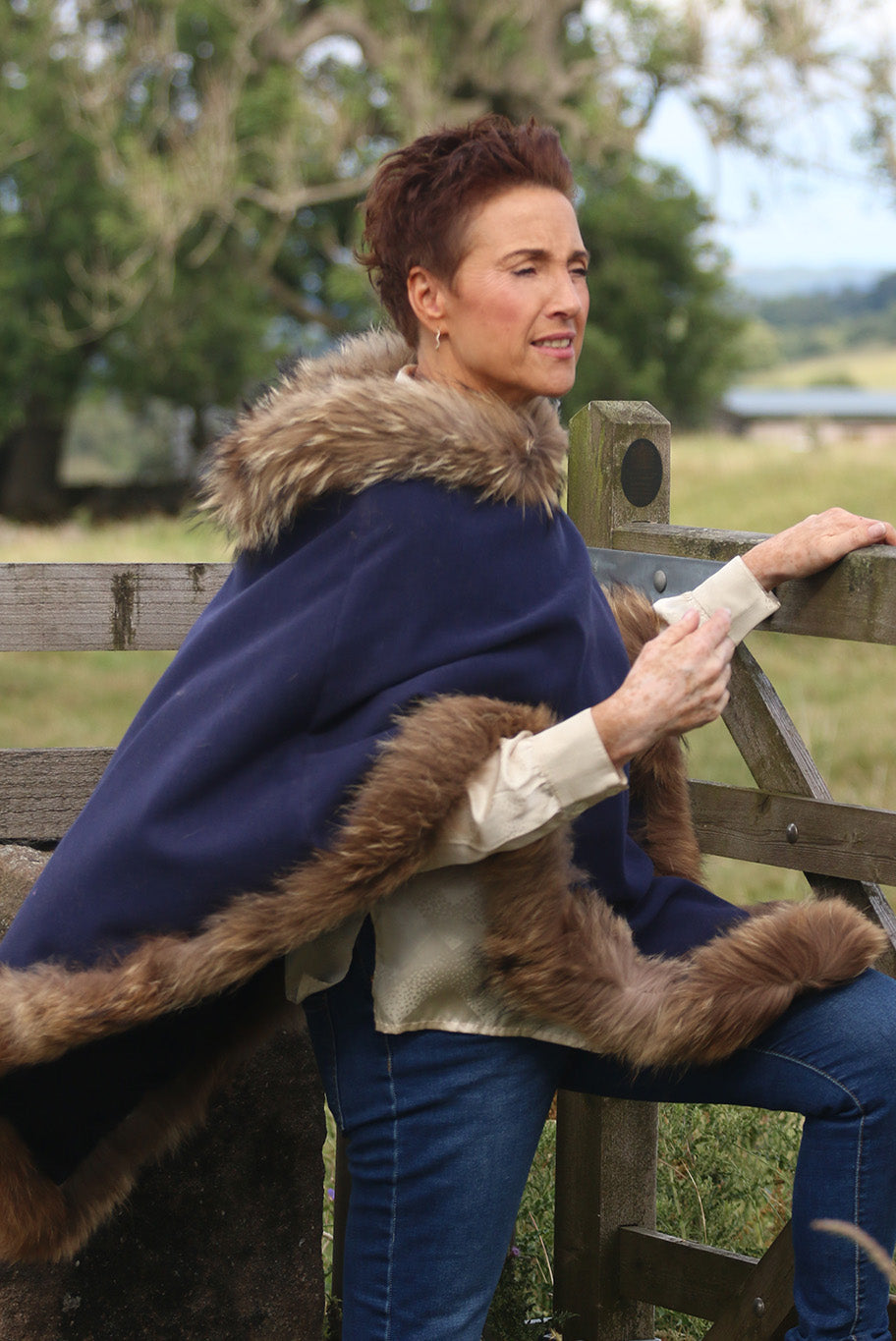 Classic Poncho style cape with reworked natural full fur trim
