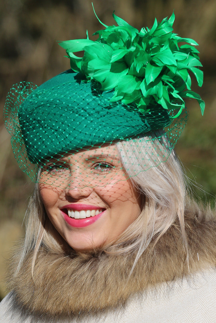 Emerald Pill Box style headpiece with Feather display