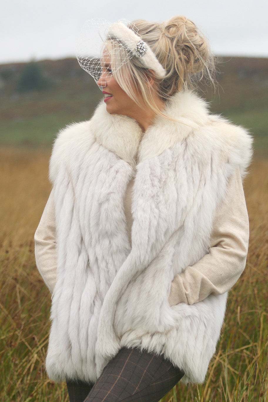 Faux fur headband with birdcage veil and diamante brooch