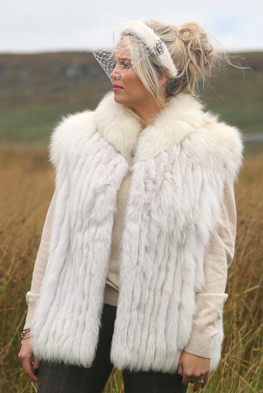 Faux fur headband with birdcage veil and diamante brooch