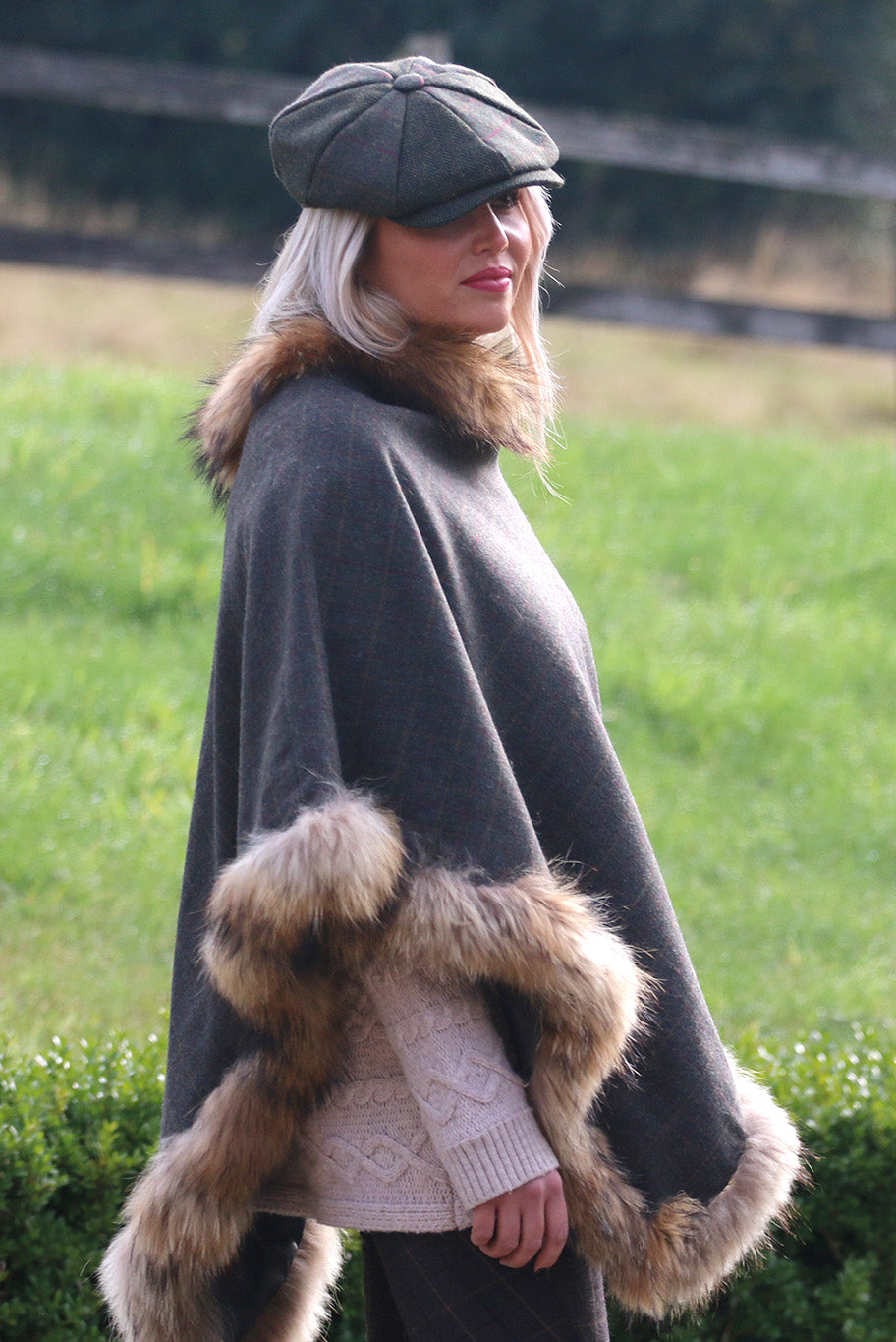 Classic Poncho style cape with reworked natural full fur trim