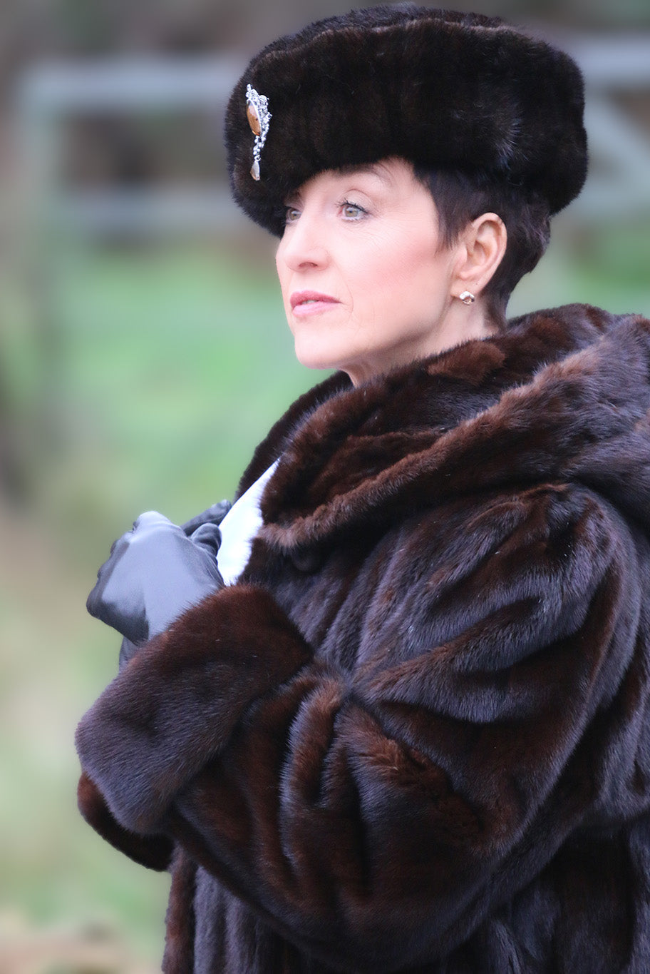 Hooded vintage female mink coat