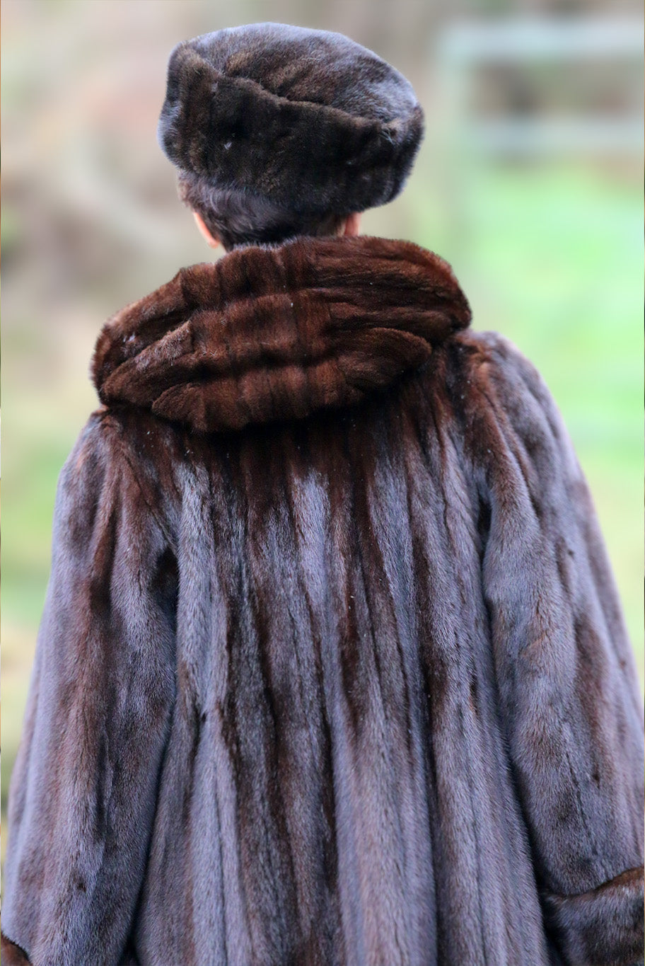 Hooded vintage female mink coat