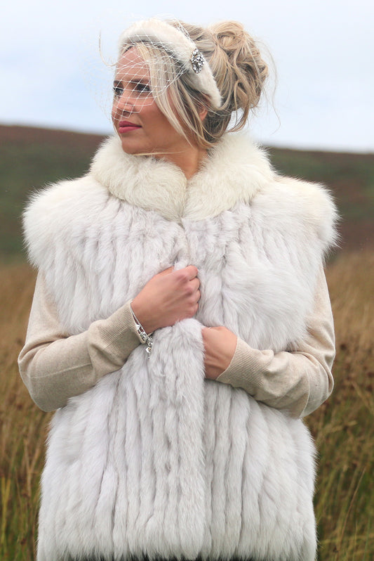 Faux fur headband with birdcage veil and diamante brooch